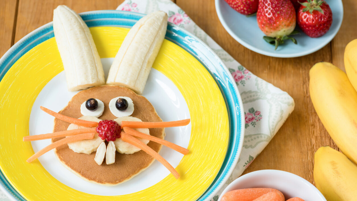 Creative Colorful Breakfast For Kids. Easter Bunny Shaped Pancake With Fruits