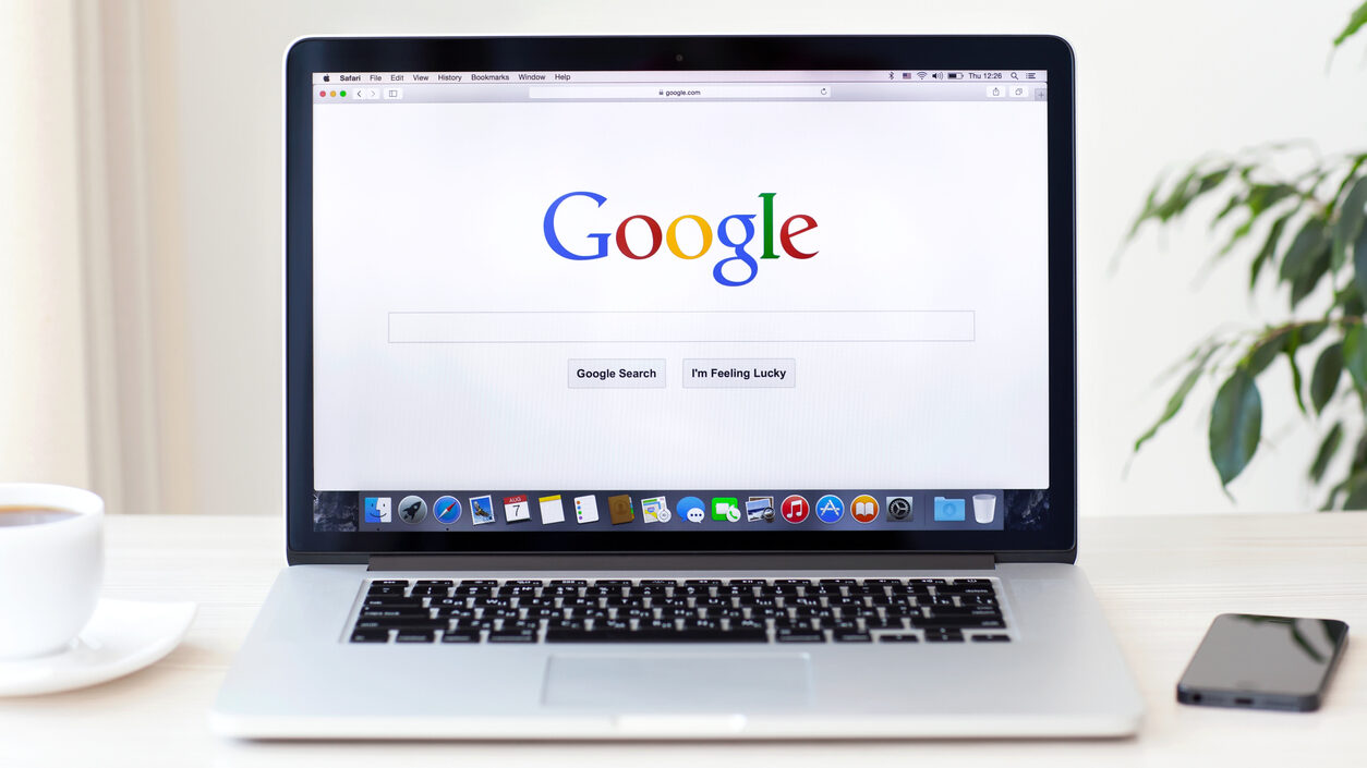 Macbook Pro Retina With Google Home Page On The Screen